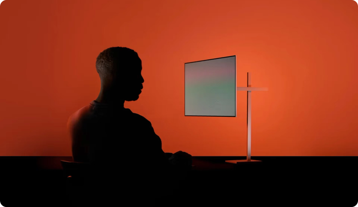 Amjad Masad speaking at a tech conference